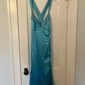Peacock blue open back gown